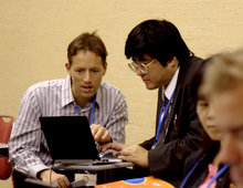 Randall Britten helps out a member of the community at a previous workshop.